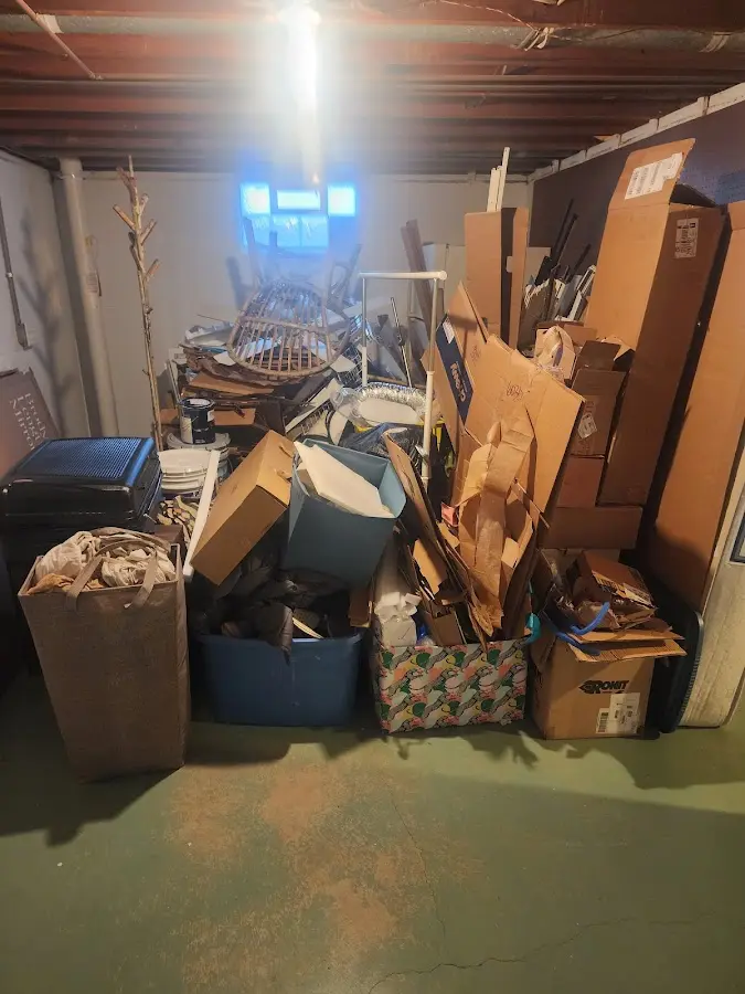 Roll-off dumpster container at job site for 6 Yard Dumpster Rental in Bonham